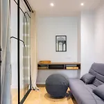 Sunlit Parisian Home With Balcony And Open Views