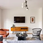 Sunlit Parisian Home With Balcony And Open Views
